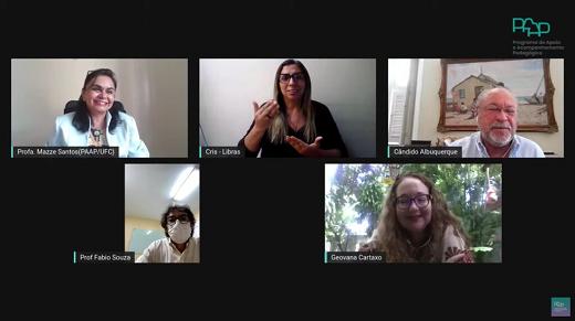 Em sentido horário, a Profª Maria José (Mazzé) Costa dos Santos, coordenadora de Inovação e Desenvolvimento Acadêmico da EIDEIA; a intérprete de libras Cristiane Farias, da UFC Inclui; o reitor da UFC, Prof. Cândido Albuquerque; a pró-reitora de Assuntos Estudantis, Profª Geovana Cartaxo; e o Prof. Fábio Gomes de Matos Souza, coordenador do Programa de Apoio à Vida (PRAVIDA) (Imagem: canal do PAAP no YouTube) Imagem: Print da tela da live de lançamento do curso Guardiães da UFC